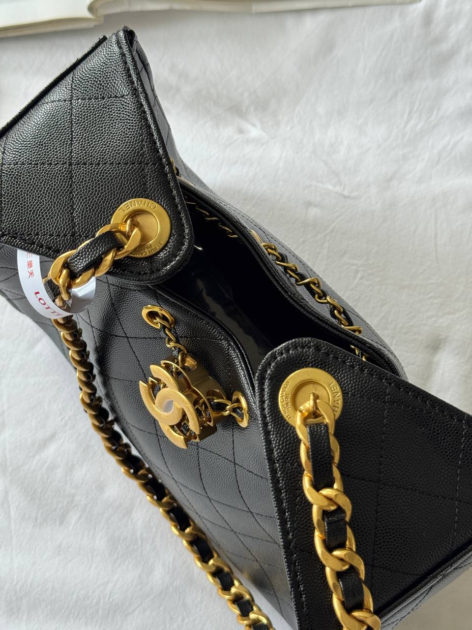 Chanel 25 Handbag in Black With Gold Hardware - 11