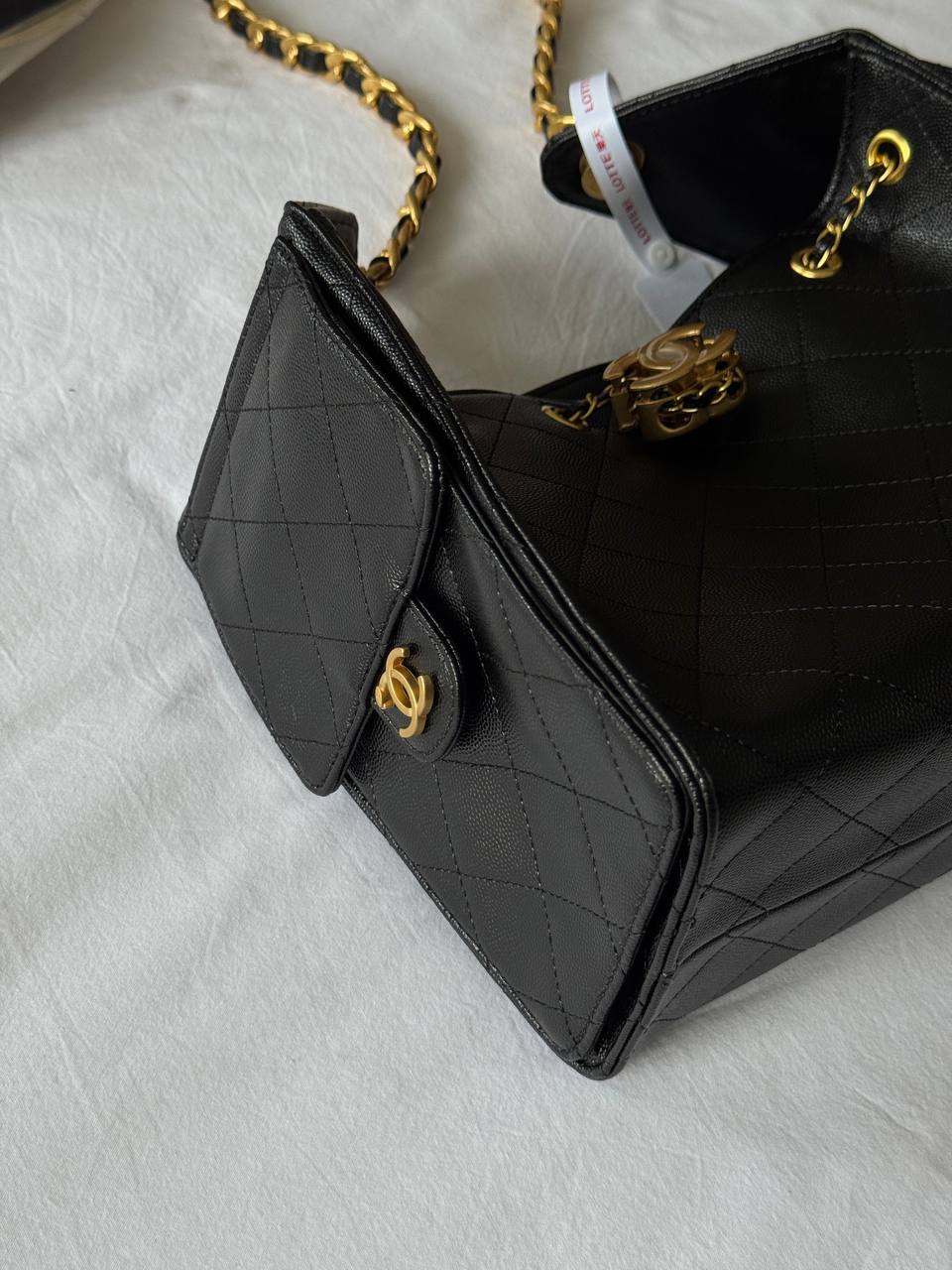 Chanel 25 Handbag in Black With Gold Hardware - 13