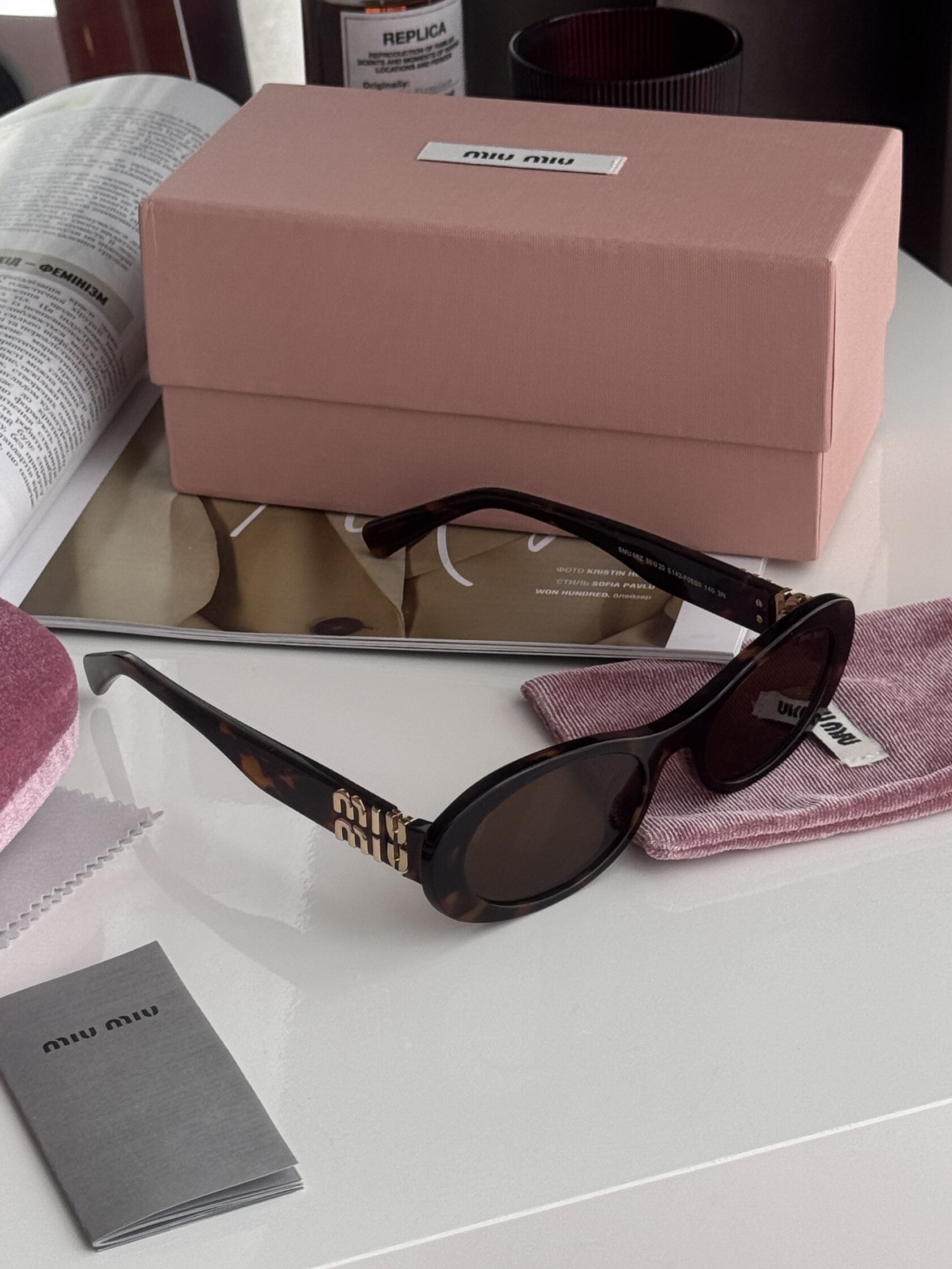 Miu Miu Leo/Gold SMU 06Z E142-F05S0 3N - 4